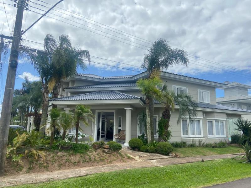 Casa em Condomínio e 4 dormitórios no bairro ATLÂNTIDA LAGOS PARK em Xangri-lá para Comprar